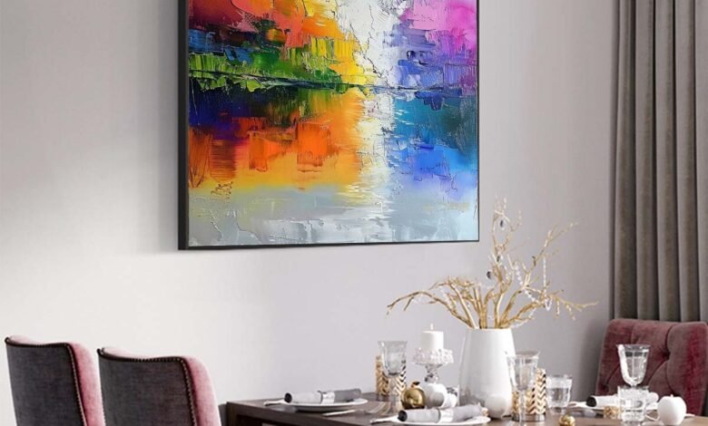 Contemporary Paintings Pakistan featuring a vibrant abstract artwork with bold colors displayed in a modern dining room interior for elegant home décor.
